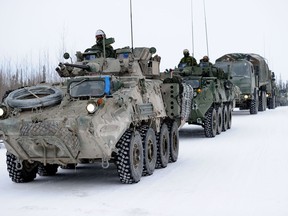 English
RE2012-0007-038
19 February 2012
Yellowknife, Northwest Territories 
EXERCISE ARCTIC RAM

A line of armoured vehicles, trucks and snowmobiles wait their turn to drive onto the ice road leading up to WhaTi, Northwest Territories, during EXERCISE Arctic Ram.

EXERCISE Arctic Ram is 1 Canadian Mechanized Brigade Group’s inaugural training exercise which is being conducted in the Northwest Territories from February 14 to 26, 2012. It is the biggest and most complex Army-led exercise ever undertaken in the Canadian Arctic. It will allow our soldiers to reacquire winter soldier skills and improve the Canadian Army Arctic capabilities. 

Photo Credit: Cpl Lindsay Grimster, CFJIC
© 2012 DND-MDN Canada

French/Français
RE2012-0007-038
19 février 2012
Yellowknife (Territoires du Nord-Ouest) 
Exercice Arctic Ram

Une file de véhicules blindés, de camions et de motoneiges attendent d’emprunter la route de glace menant à WhaTi (Territoires du Nord-Ouest) lors de l’exercice Arctic Ram. 

L’exercice A