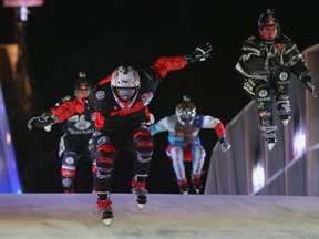 Cameron Naasz of the U.S. leads skaters in the Red Bull Crashed Ice Cross Downhill World Championship 2015/16 in Munich on Jan. 9.