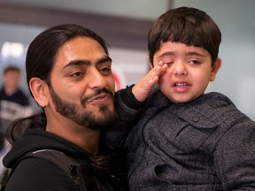 Bhavna Bajaj (mom) and Aman Sood (dad) were reunited with their 4 1/2-year-old son Daksh Sood after being separated for more than three years. A very tired Daksh shows the strain of a long trip home. Thursday January 21, 2016.