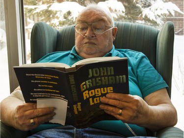 Clients of May Court's day hospice can pretty much do what they like, even if it's simply reading quietly among the others. Here Jack Boes reads his favourite author. Boes was initially reluctant to attend the weekly program, doing it only to appease his wife. These days he takes part twice a week, and looks forward to it.