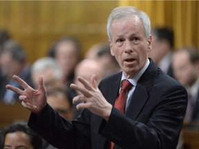 Foreign Affairs Minister Stephane Dion answers a question in the House of Commons.