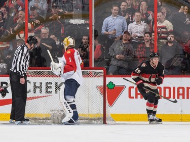 Max McCormick #89 of the Ottawa Senators celebrates his first career NHL goal against Roberto Luongo #1 of the Florida Panthers.