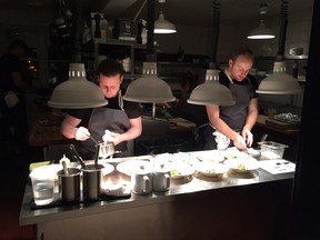 Chefs Adam Vettorel and Oliver Truesdale-Jutras plating dishes at the North & Navy / Stovetrotter dinner in late January 2016.