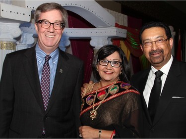 From left, Mayor Jim Watson with Anita Merchant and her husband, Dr. Pradeep Merchant, at an inaugural gala evening supporting Free The Children's Adopt A Village India, held at the Hilton Lac Leamy on Saturday, January 30, 2016. (Caroline Phillips / Ottawa Citizen)