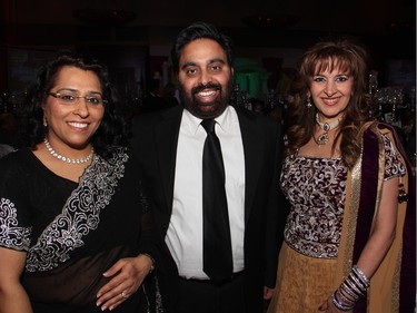 From left, Ottawa dentist Dr. Razia Arora and veterinarian Dr. Rajiv Arora with their RBC corporate table host, Nargis Schutte, at an inaugural gala evening supporting Free The Children's Adopt A Village India, held at the Hilton Lac Leamy on Saturday, January 30, 2016. (Caroline Phillips / Ottawa Citizen)