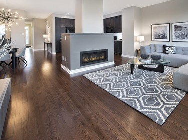 The Amherst single is a Tartan signature: it boasts standard finishes to show how good a home can look without having to spend a fortune on upgrades. The urban contemporary style is accentuated by a free-standing linear fireplace that separates the kitchen and great room while still keeping an open-concept feel.