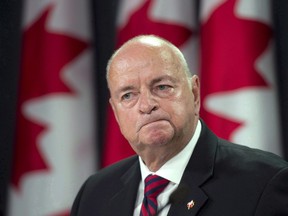 Canada's veterans ombudsman Guy Parent speaks after releasing the Report on the New Veterans Charter and Actuarial Analysis Tuesday October 1, 2013 in Ottawa.