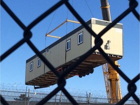 Trailer is being placed at the Innes Road jail Jan. 4, 2016 to house managers in the event of a strike.