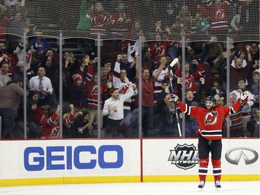New Jersey Devils right wing Kyle Palmieri celebrates after scoring a goal against the Ottawa Senators during the first period.