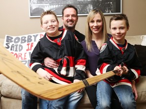 Cole Jansen, Warren Jansen, Amber Kirkwood and Reece Hubbard already have a signed Bobby Ryan stick after he scored against the Rangers, and the next exciting arrival will be a puppy, thanks to the goal — and a wager with Dad.