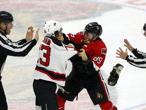 Senators rookie Max McCormick, shown tangling with New Jersey' Bobby Farham has always admired the Blackhawks superpest Andrew Shaw.