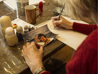 Mary MacKinnon takes part in the day hospice program at May Court. She is creating a series of nesting dolls depicting seven generations of her family, which she plans on giving to her son, Liam, as a remembrance.