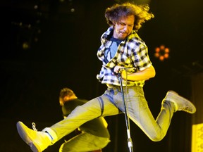 Eddie Vedder and Pearl Jam on stage at the Canadian Tire Centre in 2011. 
(Christopher Pike / Ottawa Citizen)