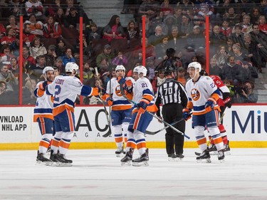 Nick Leddy #2 of the New York Islanders celebrates his first period power play goal against the Ottawa Senators with teammates Frans Nielsen #51, John Tavares #91, Kyle Okposo #21 and Anders Lee #27.