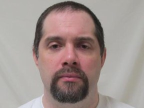 Wanted parolee Victor Buglar, 45, was arrested in Ottawa Thursday and charged with several break-and-enters.