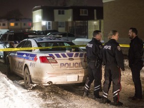 Ottawa police investigate the scene of a parking lot shooting that sent one man to hospital. Police said eight to 10 shots were heard on Debra Avenue on Thursday evening.