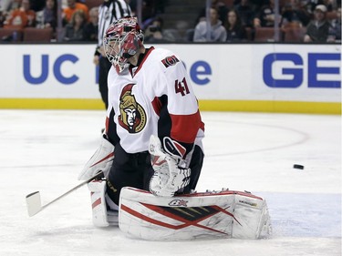 Ottawa Senators goalie Craig Anderson fails to block a goal by Anaheim Ducks center Andrew Cogliano during the second period of an NHL hockey game in Anaheim, Calif., Wednesday, Jan. 13, 2016.