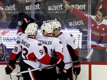 Ottawa Senators players celebrate after left wing Mike Hoffman (68) scored their first goal against the Washington Capitals during the second period of a NHL hockey game in at the Verizon Center in Washington, on Sunday, Jan. 10, 2016.
