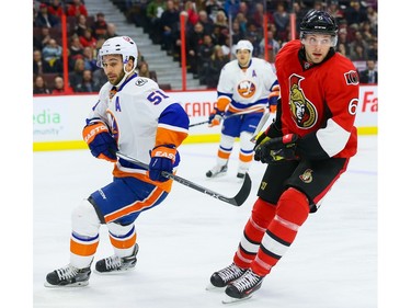 Ottawa Senators right wing Bobby Ryan (6) and New York Islanders center Frans Nielsen (51).