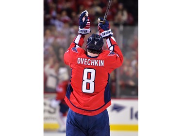 Alex Ovechkin #8 of the Washington Capitals acknowledges the fans and celebrates his 500th career NHL goal in the second period against the Ottawa Senators at the Verizon Center on January 10, 2016 in Washington, DC.