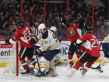 Senators Erik Karlsson celebrates his first period goal.