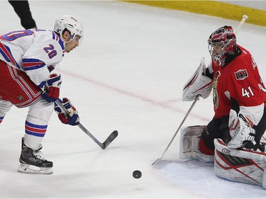 The Ottawa Senators took on the New York Rangers at the Canadian Tire Centre in Ottawa Ontario Sunday Jan 24, 2016. Senators goalie Craig Anderson makes a save against Rangers forward Chris Kreider during first period action Sunday.