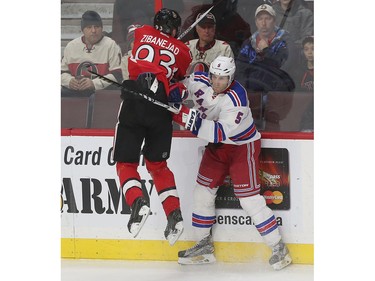 The Ottawa Senators took on the New York Rangers at the Canadian Tire Centre in Ottawa Ontario Sunday Jan 24, 2016. Senators Mika Zibanejad jumps out of the way from  Rangers Dan Girardi during second period action Sunday.