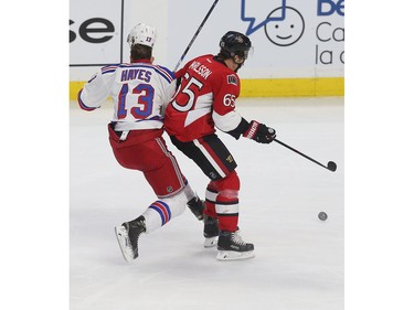The Ottawa Senators took on the New York Rangers at the Canadian Tire Centre in Ottawa Ontario Sunday Jan 24, 2016. Senators Erik Karlsson hits Rangers Kevin Hayes during first period action Sunday.