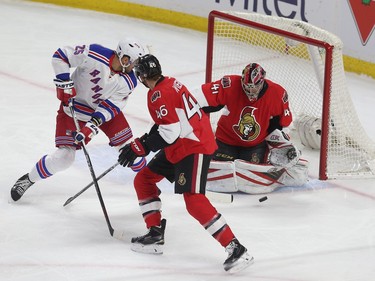 The Ottawa Senators took on the New York Rangers at the Canadian Tire Centre in Ottawa Ontario Sunday Jan 24, 2016. Senators goalie Craig Anderson makes a save against Rangers forward Viktor Stalberg during first period action Sunday.