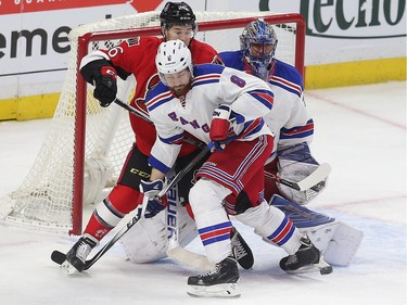 The Ottawa Senators took on the New York Rangers at the Canadian Tire Centre in Ottawa Ontario Sunday Jan 24, 2016. Senators forward Matt Puempel looks to tip the puck past Rangers goalie Henrik Lundqvist during first period action Sunday.