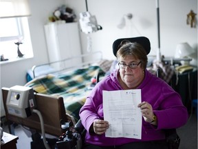 Janet Timpson, who has been riding ParaTranspo since 1986, buys a monthly bus pass, partly paid for out of her monthly Ontario Disability Support payment.