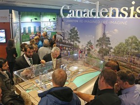 People take a look at the Canadensis presentation of the Lebreton Flats redevelopment held at the War Museum in Ottawa, January 26, 2016. Mayor Jim Watson said he was already impressed at the number of residents who came out to see the proposals for LeBreton.