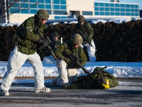 Reservists from Montreal Territorial Battalion Group participate in winter warfare training in Laval, Quebec during Exercise QUORUM NORDIQUE on January 23, 2016.

Photo: Cpl Myki Poirier-Joyal, St-Jean Imaging Section
SJ03-2016-0015-08
~
Des réservistes du Groupe-bataillon territorial de Montréal participent à une formation à la guerre hivernale, à Laval, au Québec, au cours de l’exercice QUORUM NORDIQUE, le 23 janvier 2016.

Photo : Cpl Myki Poirier-Joyal, Section d’imagerie St-Jean 
SJ03-2016-0015-08