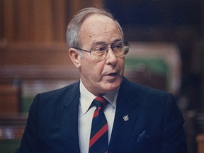 Former defence minister Robert Coates makes a statement in the House of Commons in Ottawa, June 8, 1988, to clear his name after reaching an out-of-court settlement in a libel suit with the Ottawa Citizen. Former federal defence minister Robert Coates, who resigned his post in 1985 after a controversial visit to a German strip club, has died.