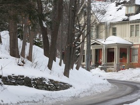 Rockcliffe Park's heritage characteristics include curving roads and mature trees.