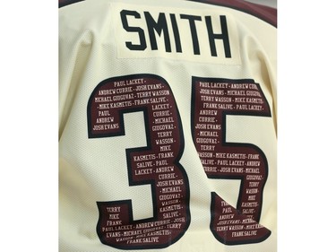 Scott Smith #35 of the Peterborough Petes wears a practice jersey that has all the name of former Peterborough Petes that played in the NHL, and wore that jersey number during warm-ups.