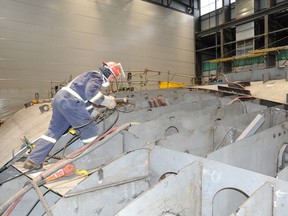 This file photo shows a worker at Seaspan shipyards in Vancouver. The Joint Support Ships will be built at Seaspan. Photo by David Pugliese