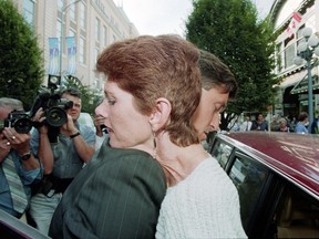 Sue Rodriguez is supported by then-MP Svend Robinson on the way to a press conference in Victoria, B.C., Sept. 30, 1993. Rodriguez, suffering from ALS, sought the help of an anonymous doctor to commit suicide.