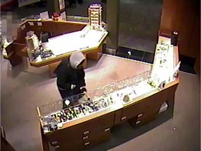 Image from video of robbery at Carlingwood Mall shop two days before Christmas.