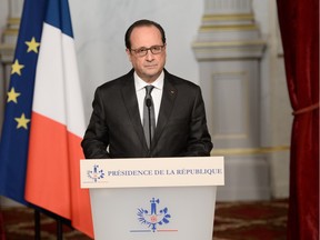 French president Francois Hollande speaks in Paris on November 14, 2015, following a series of coordinated attacks in and around Paris late Friday which left more than 120 people dead. Hollande on Saturday blamed the Islamic State group for the attacks in Paris that left at least 128 dead, calling them an "act of war".