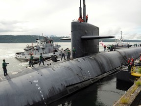 120608-N-ZZ999-425
BANGOR, Wash. (June 8, 2012) The ballistic missile submarine USS Alabama (SSBN 731) moors at the Marginal Pier at Naval Base Kitsap-Bangor after a strategic deterrent patrol. (U.S. Navy photo by Ray Narimatsu/Released)