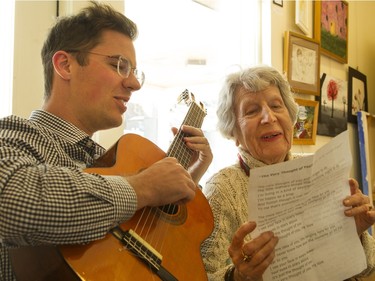 With Landon Coleman accompanying on guitar, Patricia DeGuire sings Can't Help Falling In Love at May Court's day hospice.