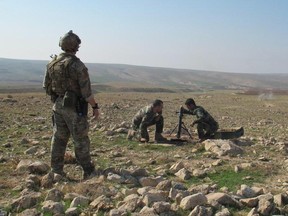 Canadian special forces are shown in this photo helping Kurdish troops in northern Iraq. Photo courtesy of DND