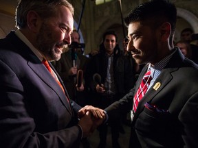 Pabjote (PJ) Lakhanpal, 19, meets NDP leader Tom Mulcair on Parliament Hill as part of his Make-A-Wish Foundation wish to be Prime Minister for the day.