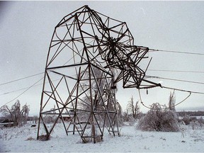 Two high-tension towers on Concession Rd 3-4 near Finch, Ont. downed by ice, pictured January 9, 1998.