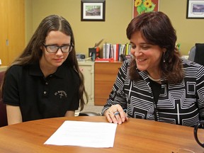 Grade 11 St. Matthew High School student Ashley Robitaille reviews her course selections for the coming year with principal Debbie Clark. St. Matthew's co-op program is giving Ashley the opportunity to explore diverse interests before she graduates.