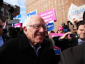 CONCORD, NH - FEBRUARY 09:  Democratic presidential candidate Senator Bernie Sanders (D-VT) walks through downtown Concord on election day on February 9, 2016 in Concord, New Hampshire.  Sanders, who is expected to win over Democratic rival Hillary Clinton, greeted voters before taking a short walk where he was mobbed by members of the media.