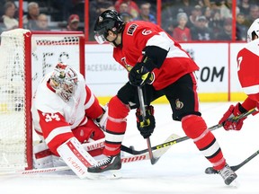 Bobby Ryan of the Ottawa Senators shows off his great hands as he shoots between the legs on Petr Mrazek of the Detroit Red Wings during the first period at the Canadian Tire Centre on Saturday, Feb. 20, 2016.