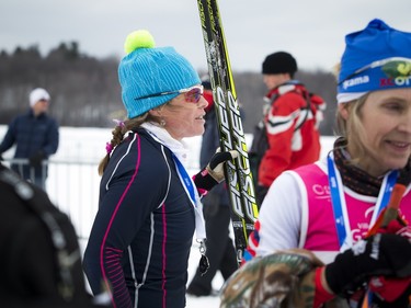 Brandy Stewart walks through the finishing area after completing the 51km Classique as the top woman at the Gatineau Loppet Saturday February 27, 2016.