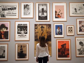 A woman looks at art in the Tate Modern Gallery in London, in a file photo.  (AP Photo/Frank Augstein)